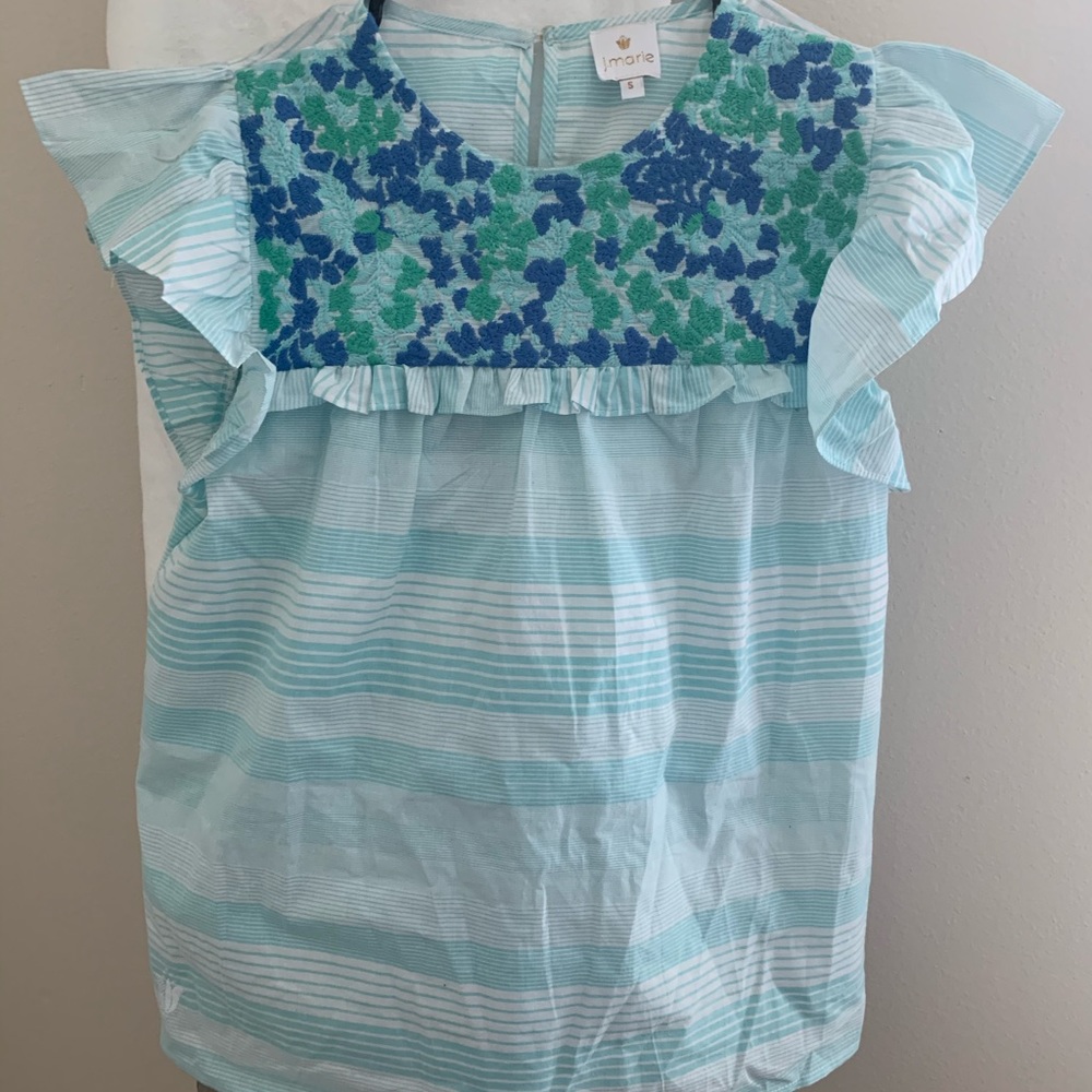 J. Marie Nora top
